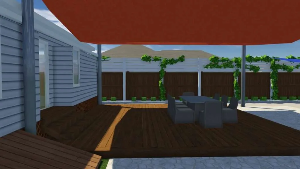 Backyard patio with dark wood deck, red shade sail, dining furniture, and climbing vines on fence panels