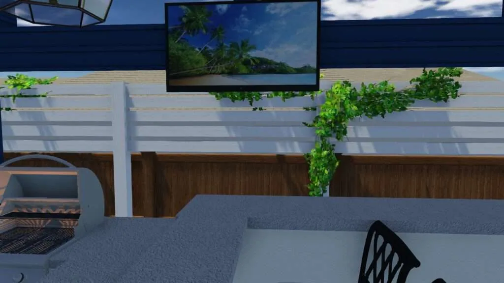 Modern patio with white pergola, green climbing vines, mounted flat-screen TV showing tropical landscape, dark wood privacy fence, and outdoor furniture under blue sky