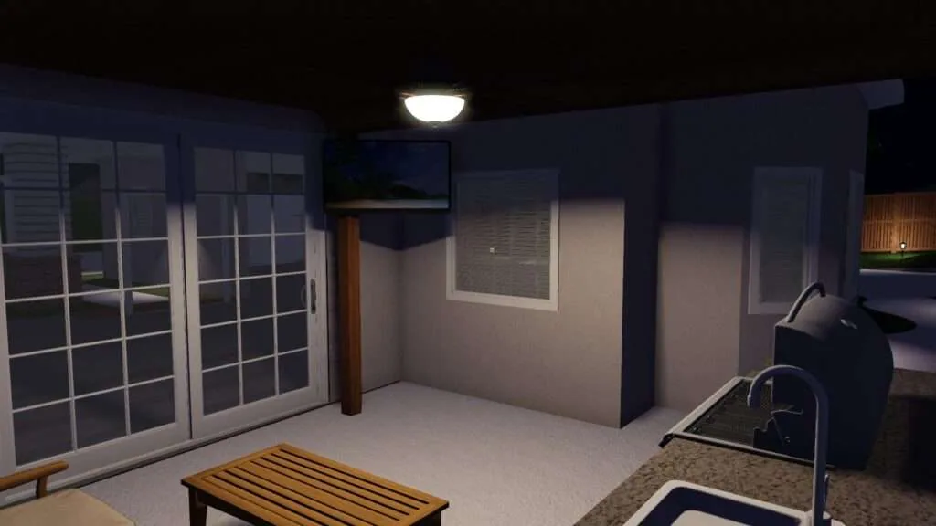 Interior of a garage at night with glass doors, overhead light, wooden bench, and tools along the wall