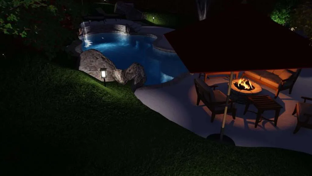 Nighttime backyard view with illuminated blue pool, large rocks, and fire pit seating area on patio